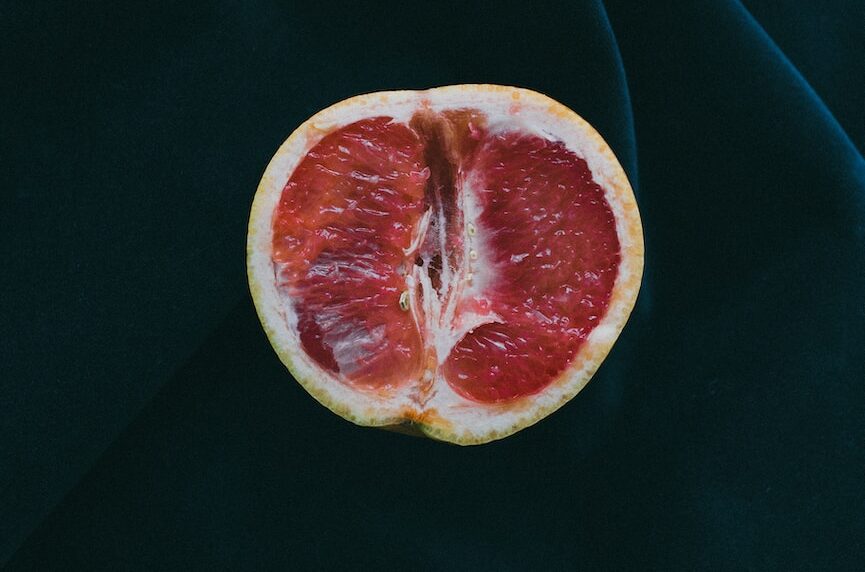 grapefruit on black surface